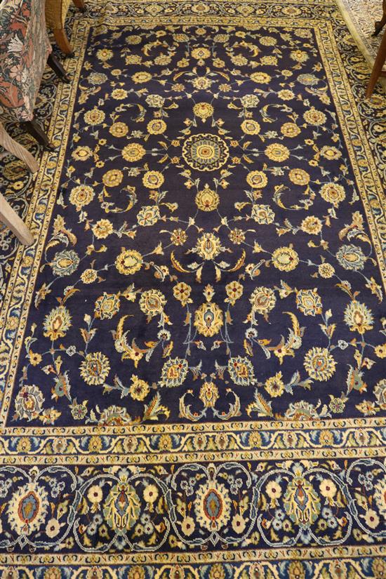 Kashan blue ground rug (-)